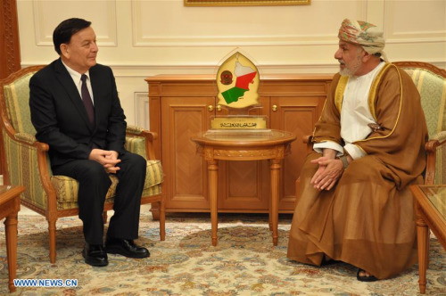 Vice chairman of the Standing Committee of China's National People's Congress and President of China-Arab Friendship Association Arken Imirbaki (L) meets with Deputy Chairman of the State Council of Oman Al Khattab bin Ghalib al-Hina'ei in Muscat, Oman, March 24, 2016.  (Xinhua/Sun Lei)