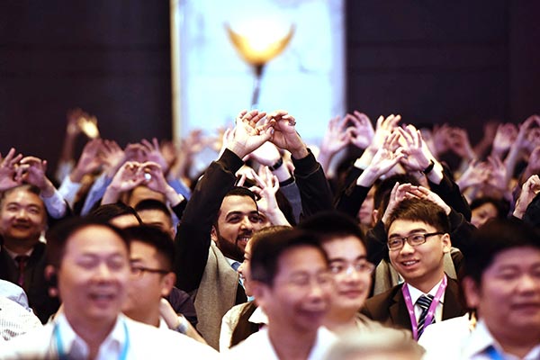 Young entrepreneurs at an international entrepreneurship forum in Hangzhou, capital of Zhejiang province. LONG WEI / FOR CHINA DAILY