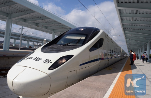 A CRH train arrives at the Jiaohe West Railway Station of the Jilin-Tumen-Hunchun high-speed railway in northeast China's Jilin Province, Sept. 20, 2015. (Photo: Xinhua/Lin Hong)