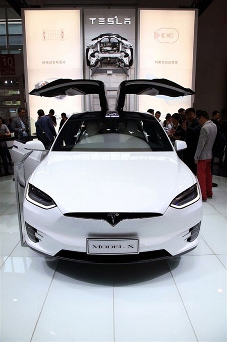 Tesla Model X electric sport-utility vehicle is seen at the Auto China 2016 show, which opened in Beijing yesterday.(Photo/Shanghai Daily)