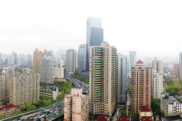 Because of purchasing limits in first-tier cities, property trades have risen rapidly in the neighboring cities of Wuxi, Jiangsu province, as well as Dongguan and Foshan in Guangdong province.(File photo)