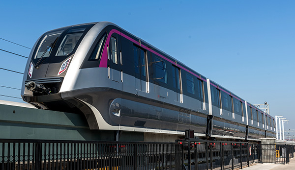 China's first monorail train powered by permanent magnet synchronous motors has completed a test run, its developers said. Provided to CHINA DAILY 
