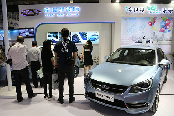 Chery new energy vehicles attract attention at the Beijing International High-tech Expo in May. (Photo/China Daily)