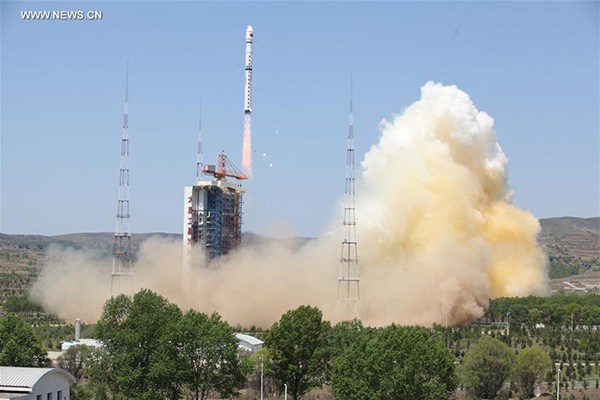 A Long March 4B rocket carrying a new civilian high-resolution mapping satellite Ziyuan III 02 and two NewSat satellites from Uruguay blasts off at the Taiyuan Satellite Launch Center in Taiyuan, capital of north China's Shanxi Province, May 30, 2016. (Photo/Xinhua)