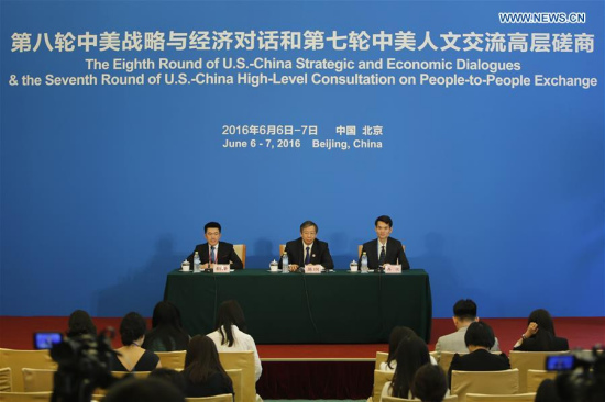 Yi Gang (C), vice governor of the People's Bank of China, attends a press conference during the eighth round of China-U.S. Strategic and Economic Dialogues and the seventh round of China-U.S. High-Level Consultation on People-to-People Exchange, in Beijing, June 7, 2016. (Xinhua/Zhang Yuwei)