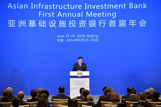Chinese Finance Minister Lou Jiwei speaks at the opening ceremony of the first Annual Meeting of the Board of Governors of the Asian Infrastructure Investment Bank (AIIB) in Beijing, capital of China, June 25, 2016. (Xinhua/Li Xin)