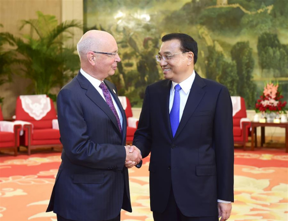 Chinese Premier Li Keqiang (R) meets with Klaus Schwab, founder and executive chairman of the World Economic Forum, in Tianjin, north China, June 26, 2016. (Xinhua/Zhang Duo)