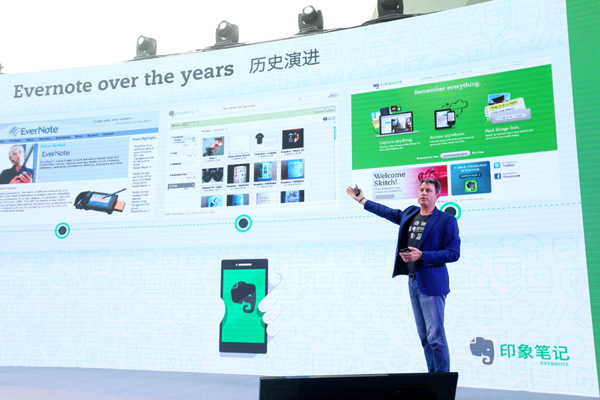 Chris O'Neill, chief executive of Evernote, introduces the company's development. (Photo/chinadaily.com.cn)