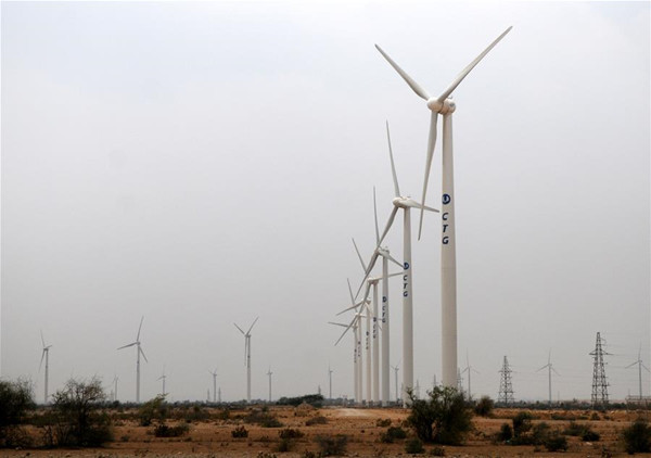 Wind turbines are seen at the Three Gorges First Wind Farm Pakistan, built, owned and operated by China Three Gorges Corporation (CTG), in Jhimpir, south Pakistan's Thatta district, July 1, 2016.(Xinhua/Ahmad Kamal)