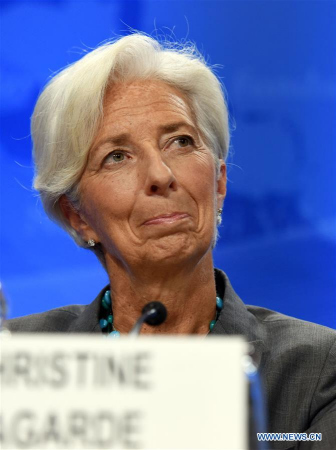 The International Monetary Fund(IMF) Managing Director Christine Lagarde reacts during a press conference in Washington D.C., the United States, on June 22, 2016.  (Xinhua file photo/Yin Bogu)