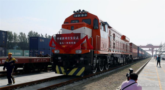 A train, which is loaded with building materials and other commodities, left Jiuyuan Logistics Park in Baotou City of north China's Inner Mongolia Autonomous Region, for Astana, capital of Kazakhstan, July 27, 2016. (Xinhua/Jia Lijun)