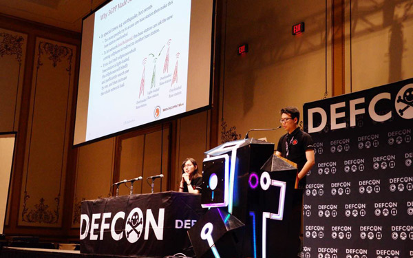 Member of 360 Unicorn Team, the cyberspace security engineer team of Qihoo 360 Technology Co, delivers speech at the DEFCON, known as the secret carnival of global hackers, held in Las Vegas, Nevada. (Photo provided to chinadaily.com.cn)