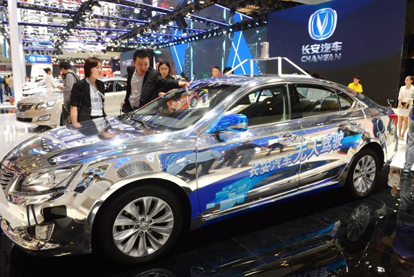 Chinese carmaker Changan displays its autonomous car at the Beijing auto show in April, after it completed a 1,931-kilometer autonomous driving test from Chongqing to Beijing. Hu Qingming / For China Daily