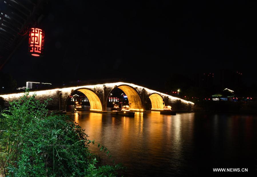 Photo taken on Aug. 30, 2016 shows the night view of Gongchen Bridge stretching over Jinghang Canal, or the Great Canal in Hangzhou, capital of east China's Zhejiang Province. (Xinhua/Chen Yehua)