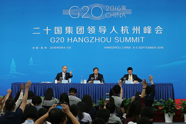 Yi Gang, vice-governor of People's Bank of China, answers questions on a press conference on Sept 2, 2016, prior to the G20 Leaders Summit to be held in Hangzhou, Zhejiang province. (Photo/China Daily)