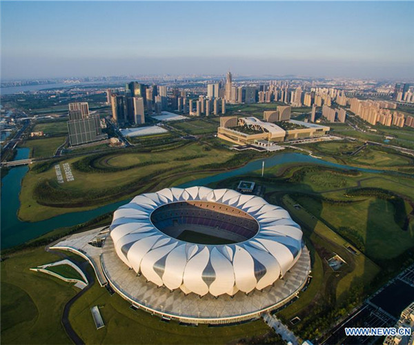 Photo taken on Aug. 25, 2016 shows the Hangzhou International Expo Center and stadium of the Hangzhou Olympic Sports Center in Hangzhou, capital of east China's Zhejiang Province. The 11th G20 summit was held in Hangzhou from Sept. 4 to 5. (Xinhua/Xu Yu)