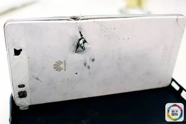 A Huawei smartphone, which saved the life of a businessman who was shot by robbers in South Africa. (Photo/Xinhua)