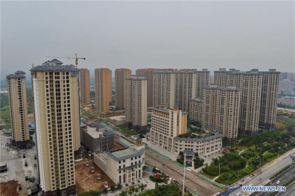 Photo taken on Sept. 18, 2016 shows a commercial property for sale in Shijiazhuang, capital of north China's Hebei Province.(Xinhua/Mou Yu)