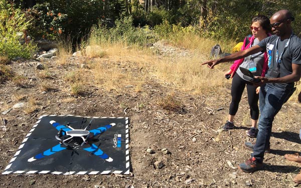 Staff member of GoPro demonstrates Karma to press after the company's products launch event held on September 19, 2016 in Squaw Valley, California. (Liu Zheng/chinadaily.com.cn)