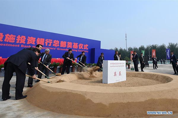 Guests attend the groundbreaking ceremony for the permanent headquarters of the Asian Infrastructure Investment Bank (AIIB) in Beijing, capital of China, Sept. 23, 2016. (Photo/Xinhua)