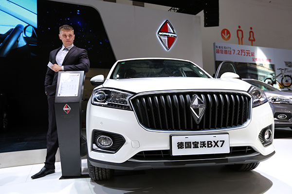 A Borgward BX7 is displayed at an auto show in Haikou, Hainan province, on Sept 10. (Photo/China Daily)