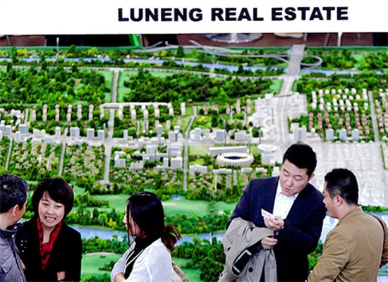 The stand of Luneng Group at a property expo in Beijing. (Photo provided to China Daily)
