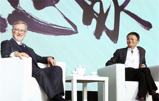 Steven Spielberg, chairman of Amblin Partners, and Jack Ma, chairman of Alibaba Group, attend an event to announce a partnership in Beijing on Sunday. (Photo provided to China Daily)