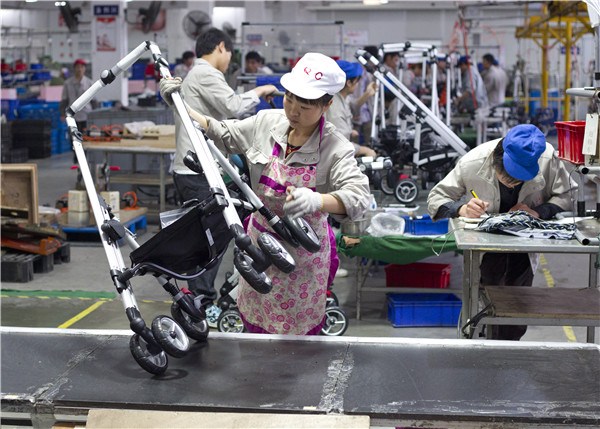 A workshop of Goodbaby Group in Kunshan, Jiangsu province. (Photo by Gao Erqiang/China Daily)