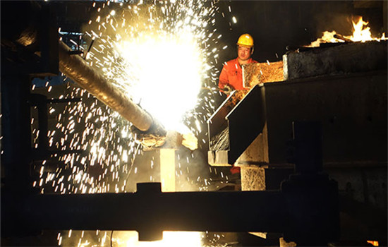 Workers at a steel factory in Dalian, Liaoning province. (Photo/China Daily)
