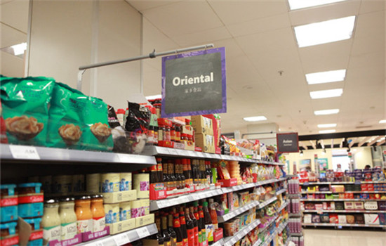 Oriental food displayed on the shelves of a local supermarket in London. (Photo by Wang Mingjie/China Daily)