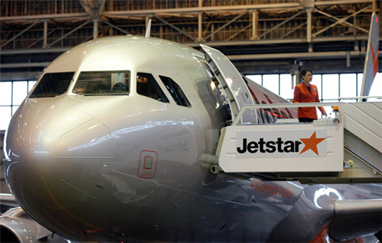 Jetstar Japan Co's first Airbus SAS A320 aircraft sits in a hangar at Narita Airport in Narita, Chiba Prefecture, Japan. (Provided to China Daily)