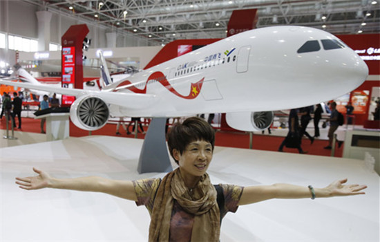 The model of a wide-body commercial jet to be built by China and Russia was unveiled at the Zhuhai air show on Wednesday. It will compete with Boeing and Airbus. (Yin Liqin / For China Daily)