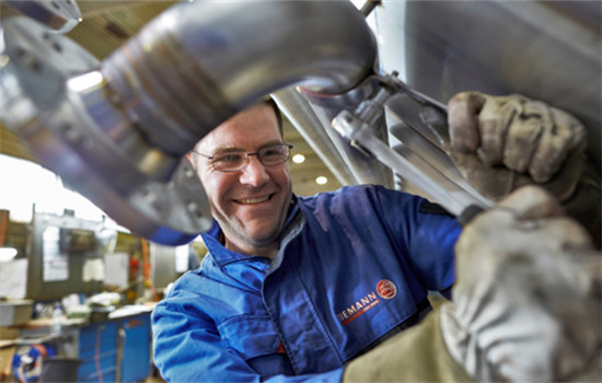 An employee of Ziemann International GmbH, a subsidiary of CIMC ENRIC, adjusts equipment at a beer brewing project in Mexico. (Photo provided to China Daily)