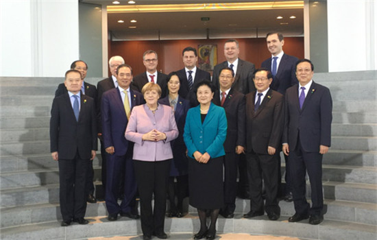 German Chancellor Angela Merkel meets the Chinese delegation before holding talks with Vice-Premier Liu Yandong in Berlin on Friday. (Photo by Fu Jing/chinadaily.com.cn)
