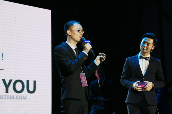 Zhu Qiming, CEO of mobile game developer Star-G Technologies, makes a speech at the business innovation competition. (Photo by Blued/provided to China Daily)