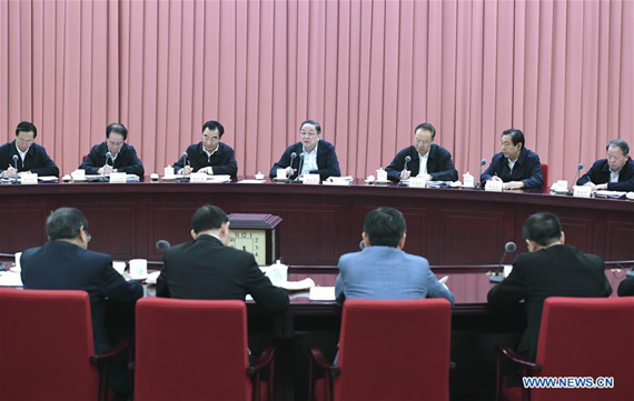 Yu Zhengsheng (C rear), chairman of the National Committee of the Chinese People's Political Consultative Conference (CPPCC), presides over a biweekly consultation session on promoting modern agriculture science and technology in Beijing, capital of China, Dec. 8, 2016. (Photo: Xinhua/Zhang Ling)