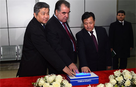 Tajikistan's President Emomali Rahmoncenter), Chairman of TBEA Zhang Xin, (right), and China's Ambassador to Kazakhstan Yue Binleft), press the start button together and announce the start of the thermal power plant operation. (Photo provided to chinadaily.com.cn