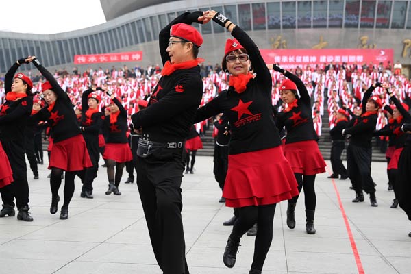 Dancers perform at the opening ceremony of a national square dancing event in Handan, Hebei province. (Photo by Hao Qunying/For China Daily)