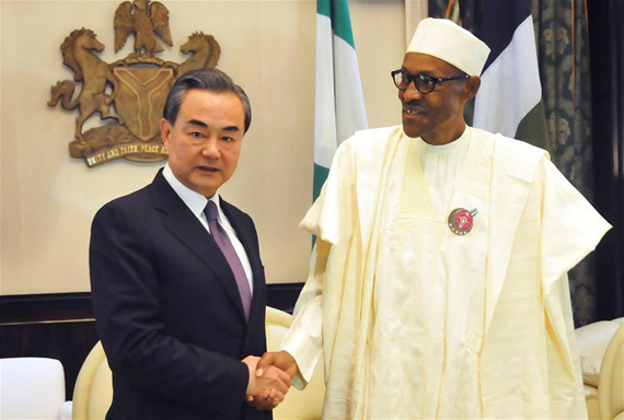 Nigerian President Muhammadu Buhari (R) meets with Chinese Foreign Minister Wang Yi in Abuja, Nigeria, on Jan. 11, 2017. The Nigerian government reaffirmed its commitment to One-China policy on Wednesday, saying Nigeria will stay committed to the long-standing friendship and cooperation with China. (Xinhua/Zhang Baoping)