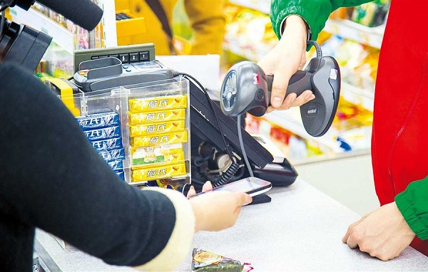 Most urban Chinese now prefer mobile payment at supermarkets.(Photo/Shanghai Daily)