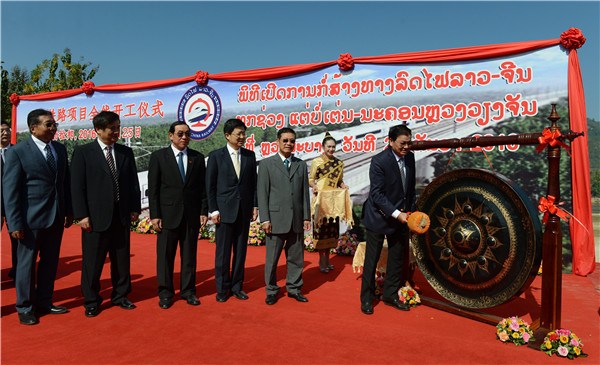A ceremony, attended by Chinese and Lao officials, is held to mark the start of China-Laos railway construction in northern Lao city Luang Prabang on Dec. 25, 2016. (Photo/Xinhua)