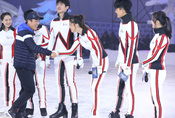 Zhang Yimou (second from the left) and other Chinese entertainment celebrities at the premiere's news conference of the Chinese version of the UK's Dancing on Ice in Beijing. YU FAN / FOR CHINA DAILY