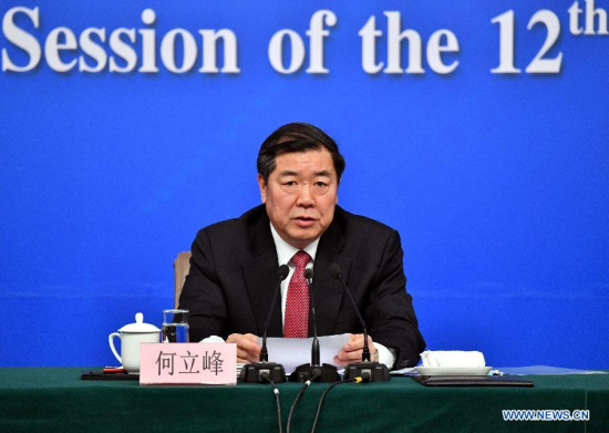 Director of the National Development and Reform Commission (NDRC) He Lifeng anwsers questions during a press conference on China's economic and social development and macro-economic control for the fifth session of the 12th National People's Congress in Beijing, capital of China, March 6, 2017. (Xinhua/Li Xin)