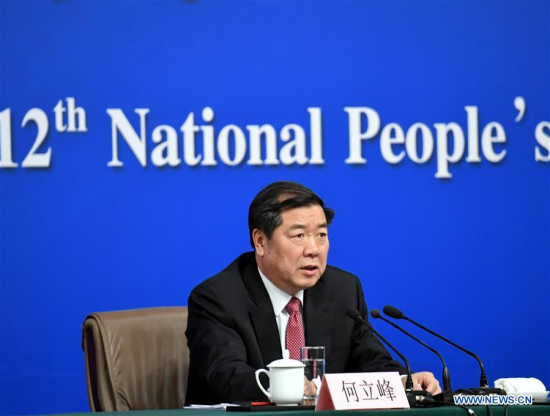 Director of the National Development and Reform Commission (NDRC) He Lifeng answers questions during a press conference on China's economic and social development and macro-economic control for the fifth session of the 12th National People's Congress in Beijing, capital of China, March 6, 2017. (Xinhua/Zhao Yingquan)