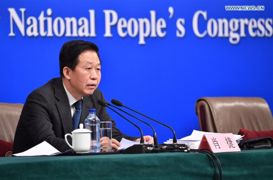 Chinese Minister of Finance Xiao Jie answers questions on reform of fiscal and taxation system and financial work at a press conference for the fifth session of the 12th National People's Congress in Beijing, capital of China, March 7, 2017. (Xinhua/Li Xin)