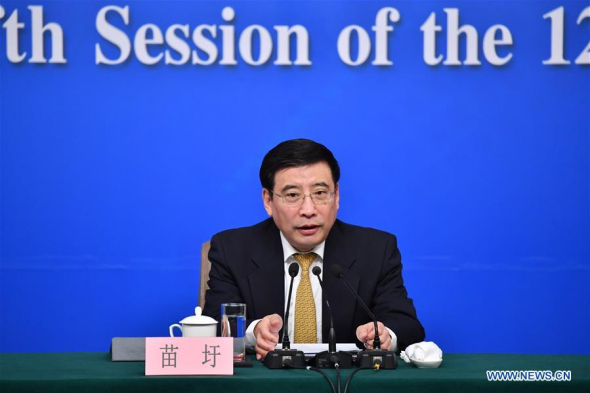 Miao Wei, Minister of Industry and Information Technology, answers questions at a press conference on Made in China 2025 plan for the fifth session of the 12th National People's Congress in Beijing, capital of China, March 11, 2017. (Xinhua/Li Xin)