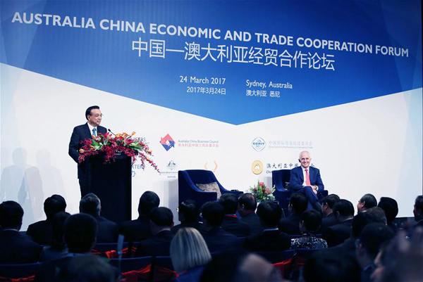 Chinese Premier Li Keqiang (L) delivers a speech at the China-Australia Cooperation on Economy and Trade Forum in Sydney, Australia, March 24, 2017. Li attended the forum together with Australian Prime Minister Malcolm Turnbull. (Xinhua/Yao Dawei)