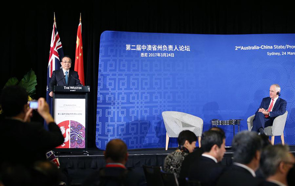 Chinese Premier Li Keqiang (L) addresses the 2nd Australia-China State/Provincial Leaders Forum in Sydney, Australia, March 24, 2017. Li attended the forum together with Australian Prime Minister Malcolm Turnbull. (Xinhua/Yao Dawei)