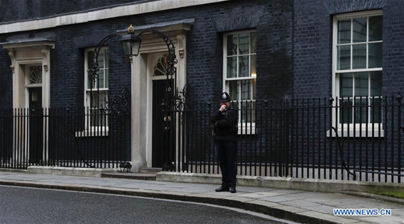 A policeman stands guard at 10 Downing Street in London March 29, 2017. British Prime Minister Theresa May on Tuesday signed the Article 50 letter to officially begin Britain's exit from the European Union, nine months after the country voted to leave the EU in a referendum, local media said. (Xinhua/Han Yan)