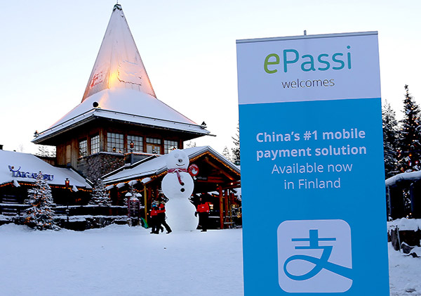 Alipay lands in the Santa Claus village in Arctic Circle, Finland, in December, 2016, signaling the first-ever mobile payment solution available in Finland. (Photo provided to China Daily)